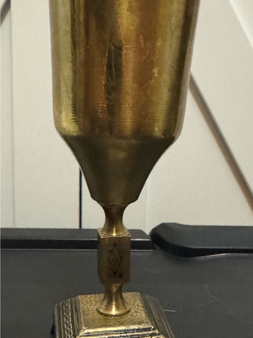 This is a mid-century vintage brass Kiddush cup